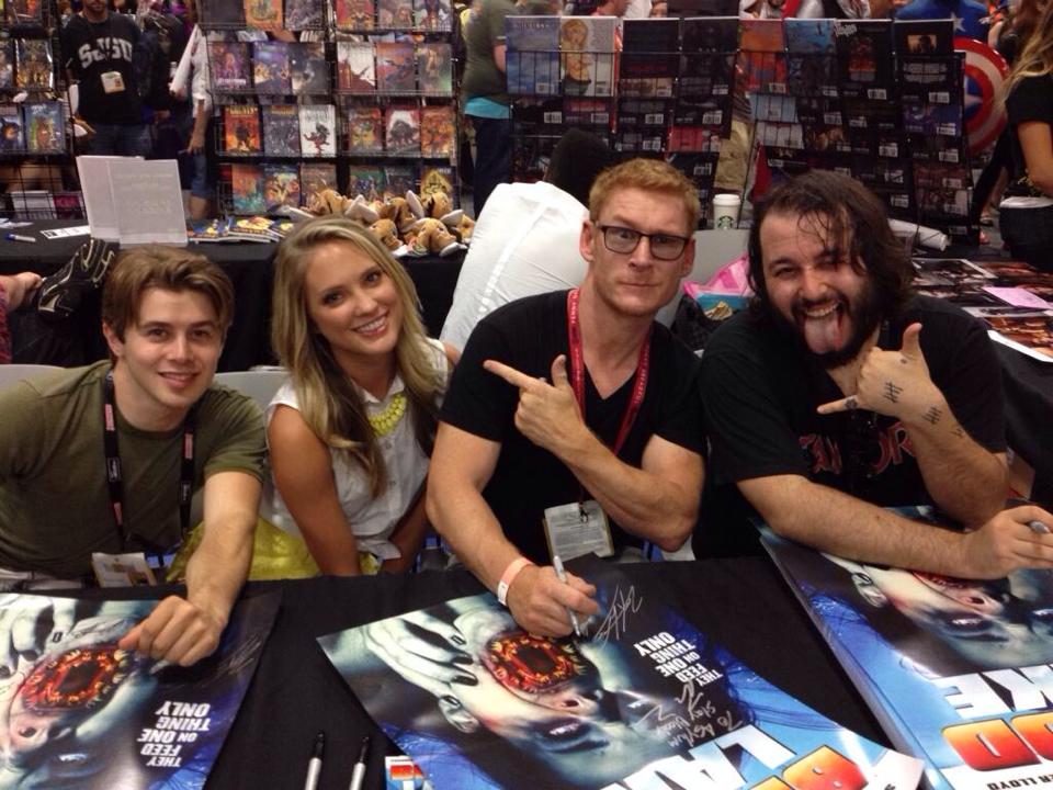 Nicholas Clark, Ciara Hanna, Zack Ward, and James Cullen Bressack signing autographs at Comic Con 2014 in San Diego.