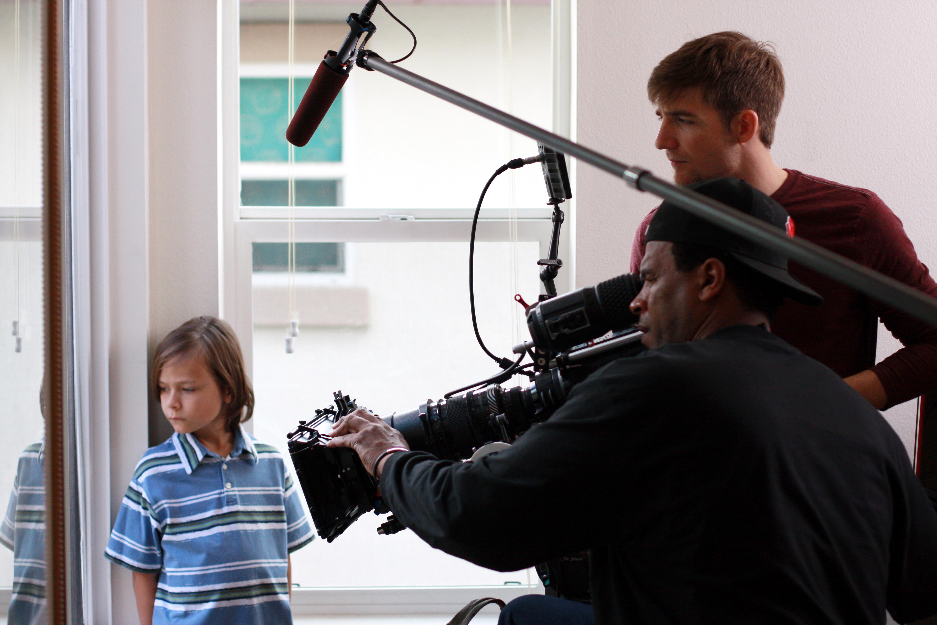 Mikey Effie on the set of THE LITTLE GIRL with Cinematographer, Keith L. Smith.