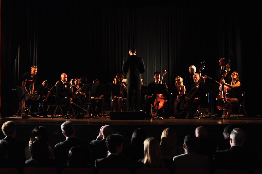 Julian prepares to conduct his symphony.