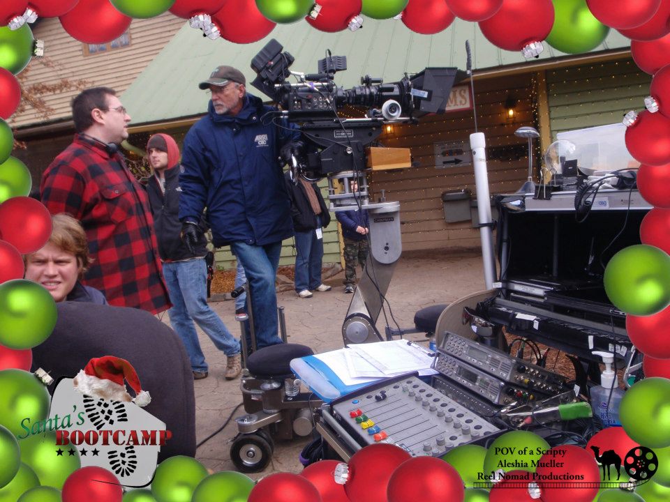 Michael E. Bierman chatting up cinematographer Mitchell Lipsiner between takes on the set of Santa's Boot Camp.