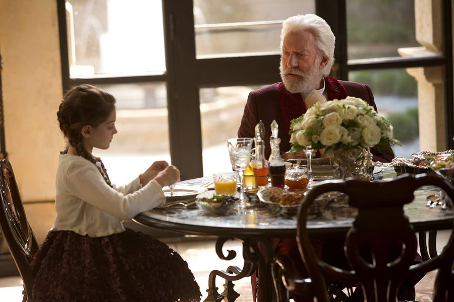 My daughter, Erika Bierman with Donald Sutherland in Hunger Games: Catching Fire.