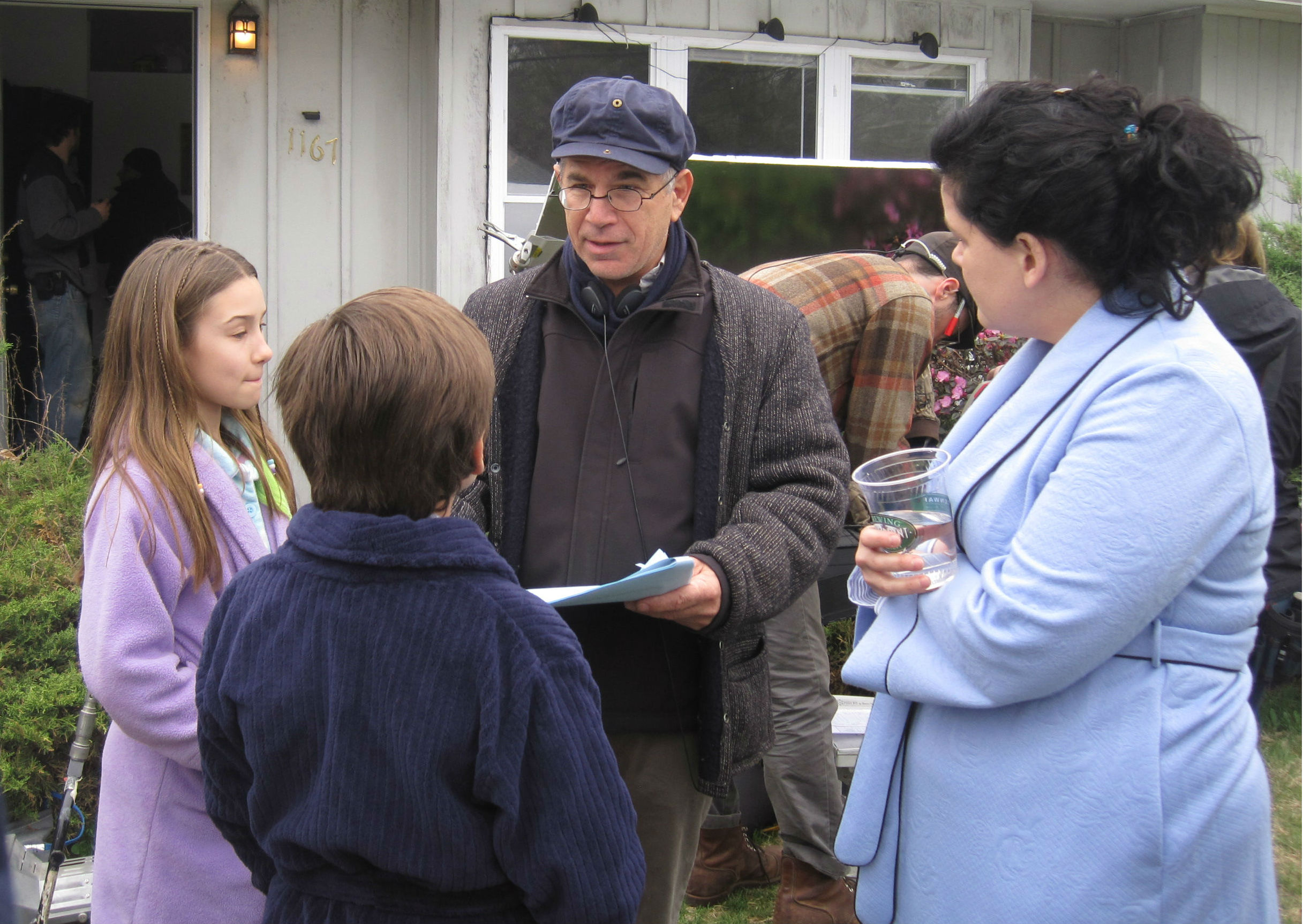 On the set of El Cielo es Azul, director Andrew Fierberg gives notes to Kylie, Nick Inzerello and actress Darlene Violette.