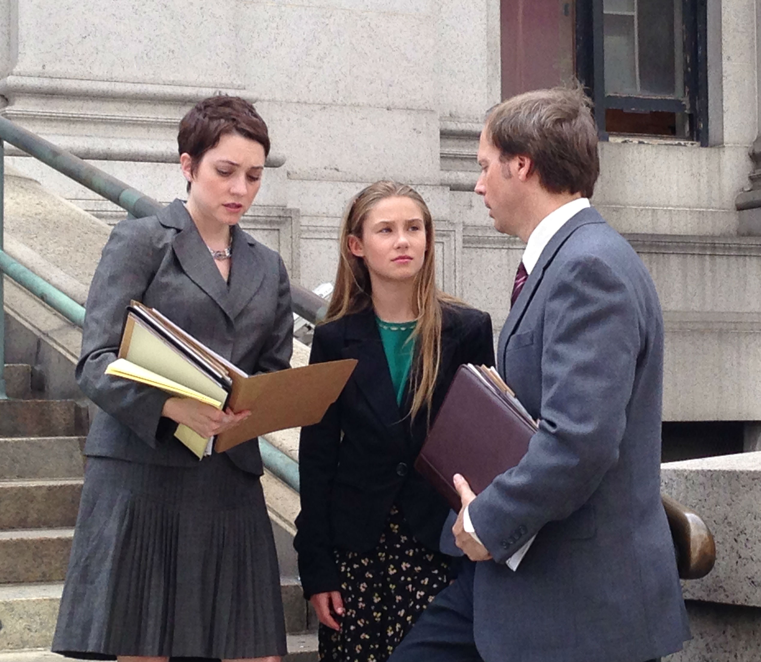 Kylie with Susan Gross & Grant Benton in a scene from 