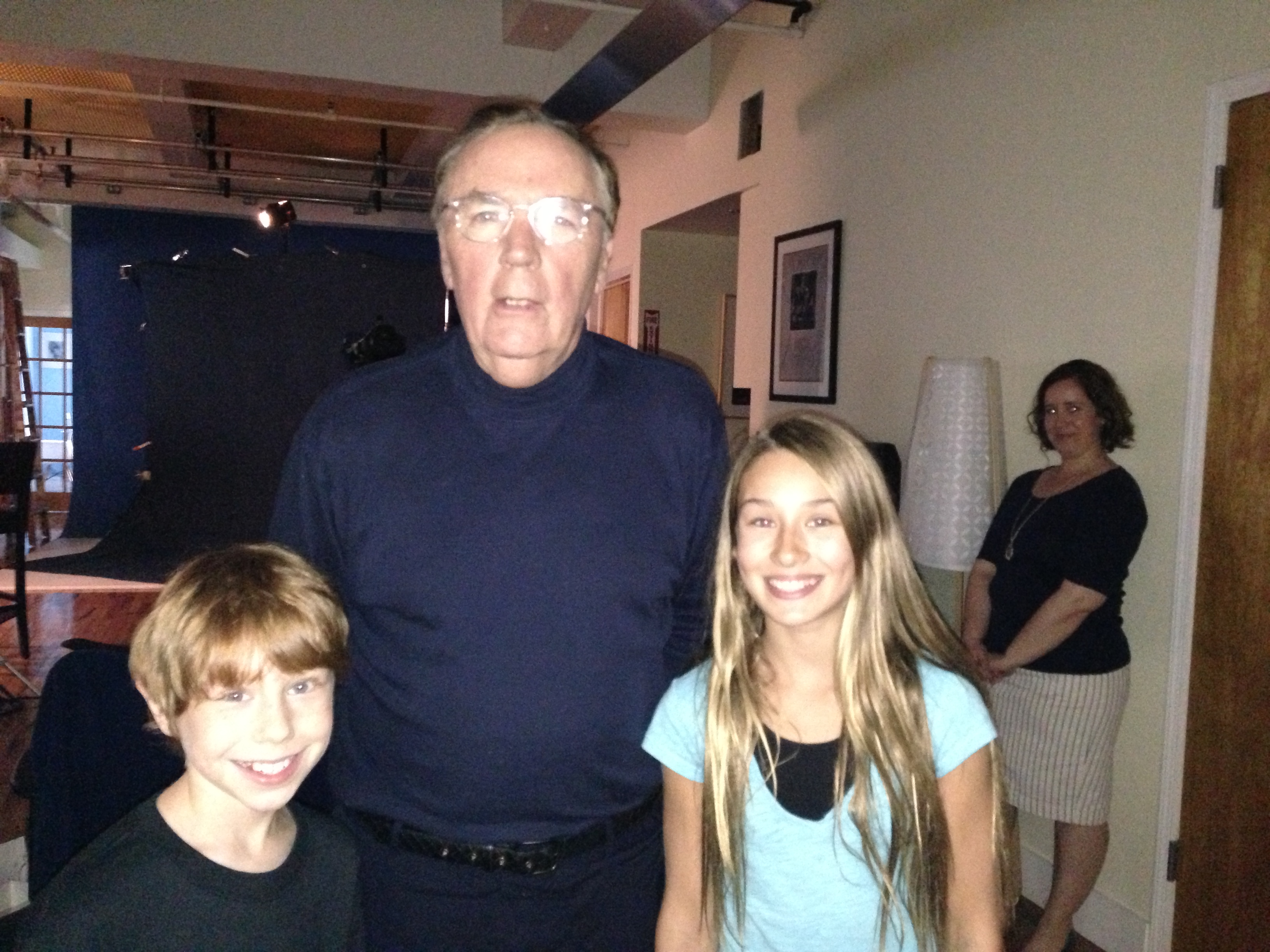 Kylie with James Patterson on the set of the commercial for his new novel 