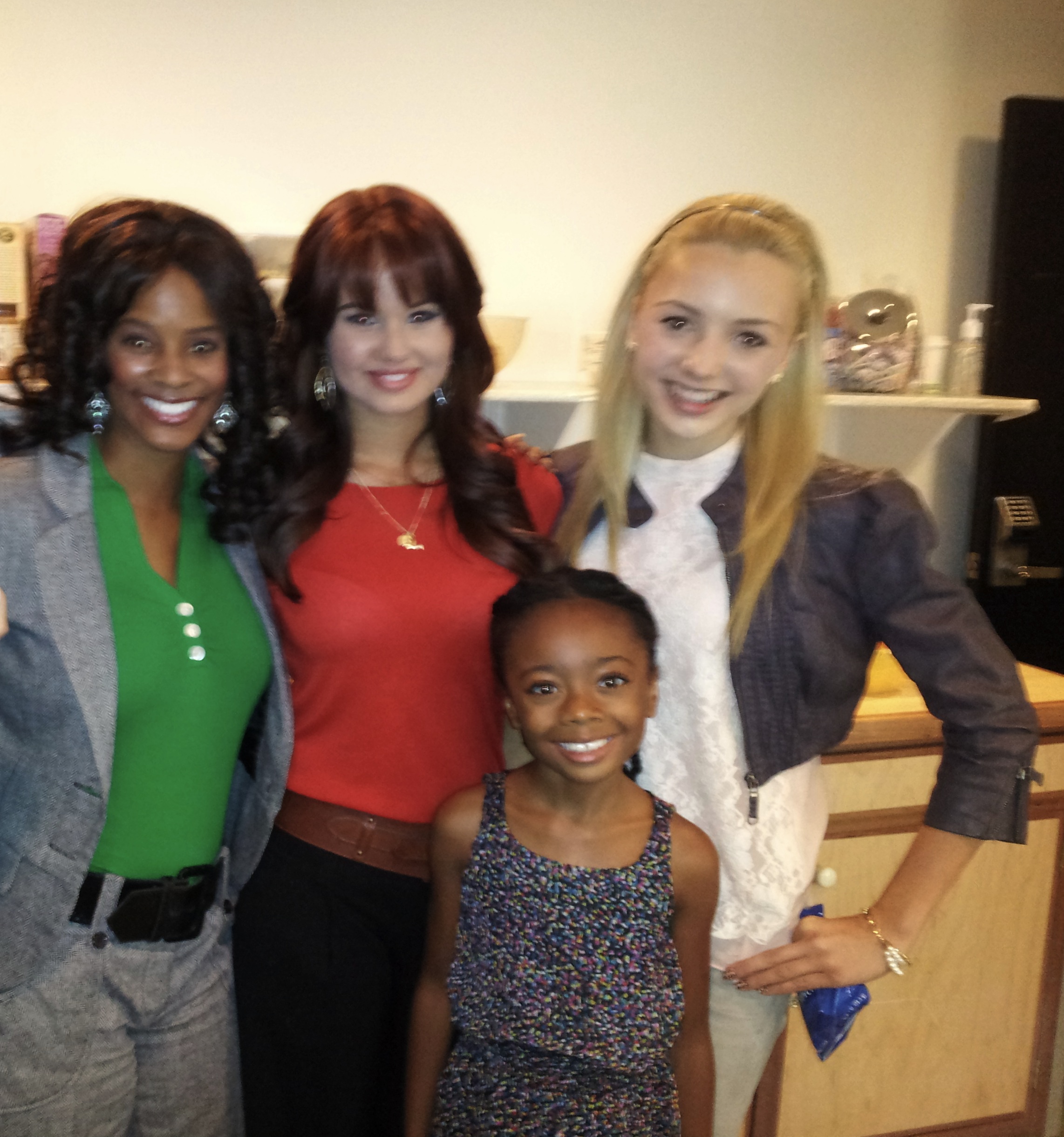 Actors Germany Kent, Debby Ryan, Peyton List, and Skai Jackson (the cast of Disney's JESSIE)