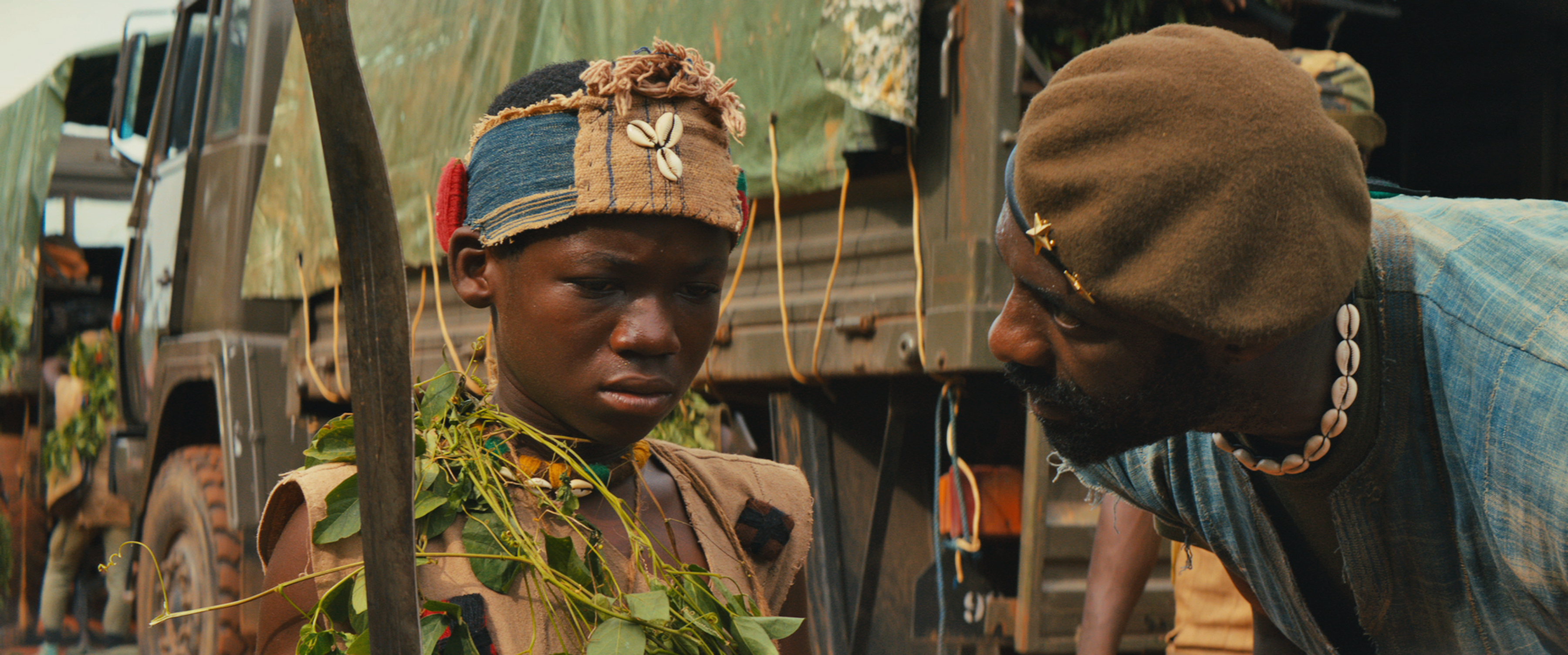 Still of Idris Elba and Abraham Attah in Beasts of No Nation (2015)