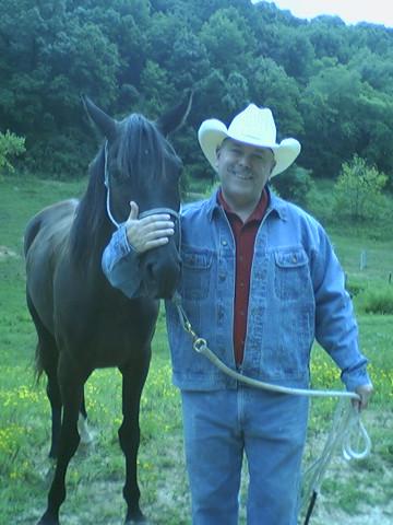 Tom holds his favorite horse from one of the ranches where he worked. Gambler was the fastest horse in the herd. Once, Tom had to ride alongside to rescue a screaming six-year-old girl from a runaway horse in the woods.