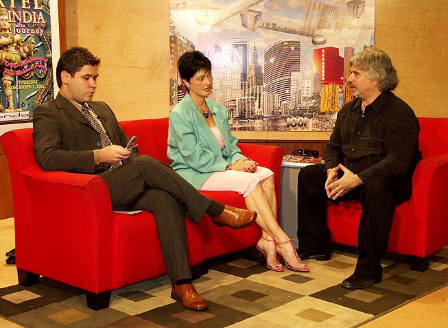 Kay Duncan, Vice Pres. of Film, Recording & Entertainment Council with Pres. Miguel Bravo (L) and TV interviewer Lawrence Gartel (R) promoting FL film industry. Duncan is Darryl Baldwin's fiance & Unique Casting® co-owner w/ Baldwin.