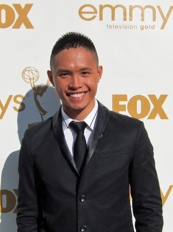 LOS ANGELES, CA - Adrian Voo attends the 63rd Primetime Emmy Awards.