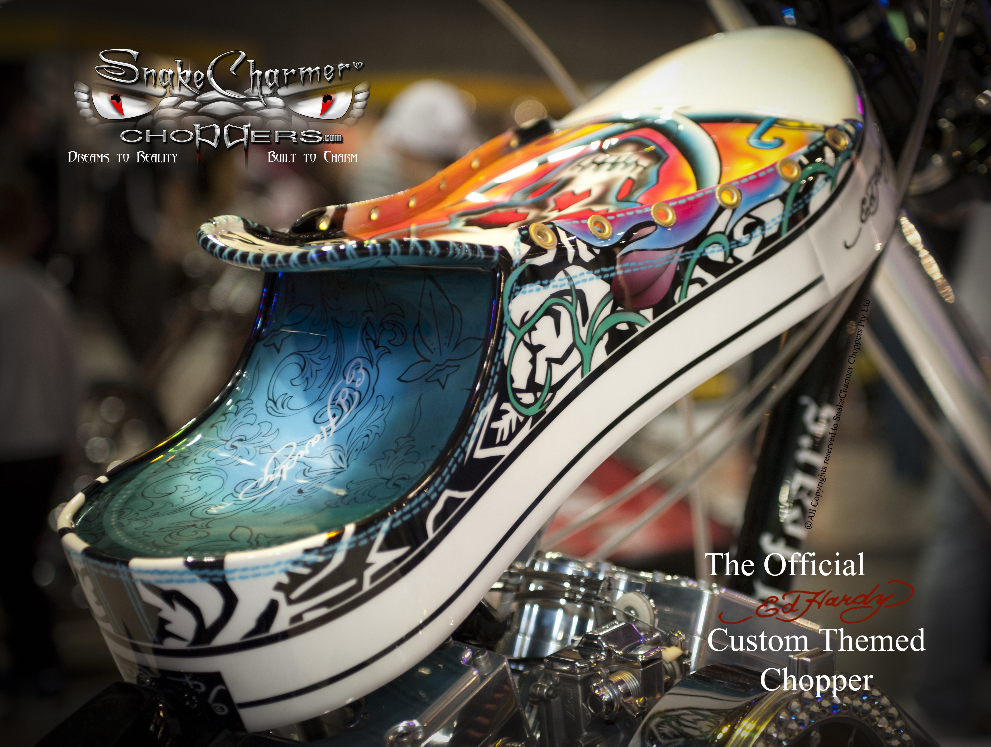 Worlds First Official Ed Hardy custom theme Chopper. Buit and designed by SnakeCharmer Choppers