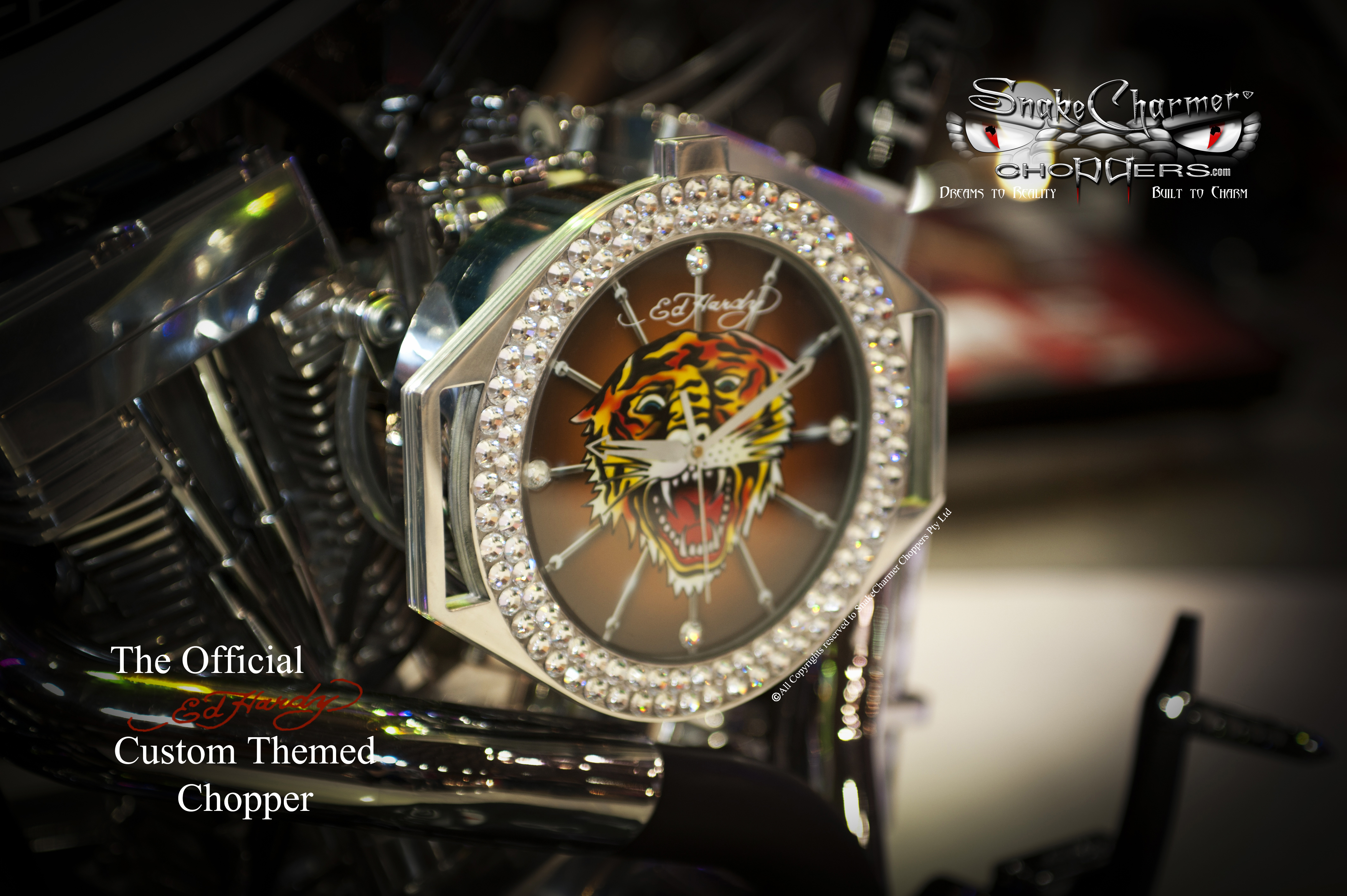 Worlds First Official Ed Hardy custom theme Chopper. Buit and designed by SnakeCharmer Choppers