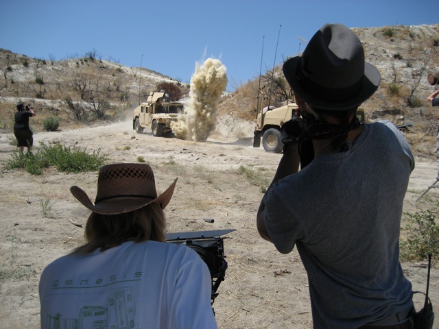 Blowing up Hummers in the desert.