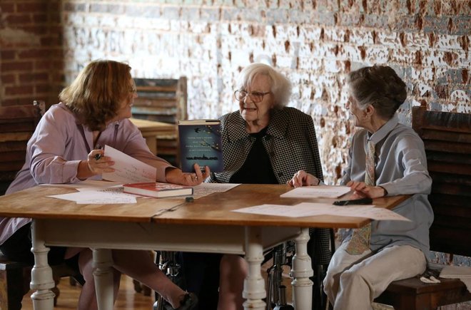 Mary McDonagh Murphy shows Harper Lee her copy of Go Set a Watchman.