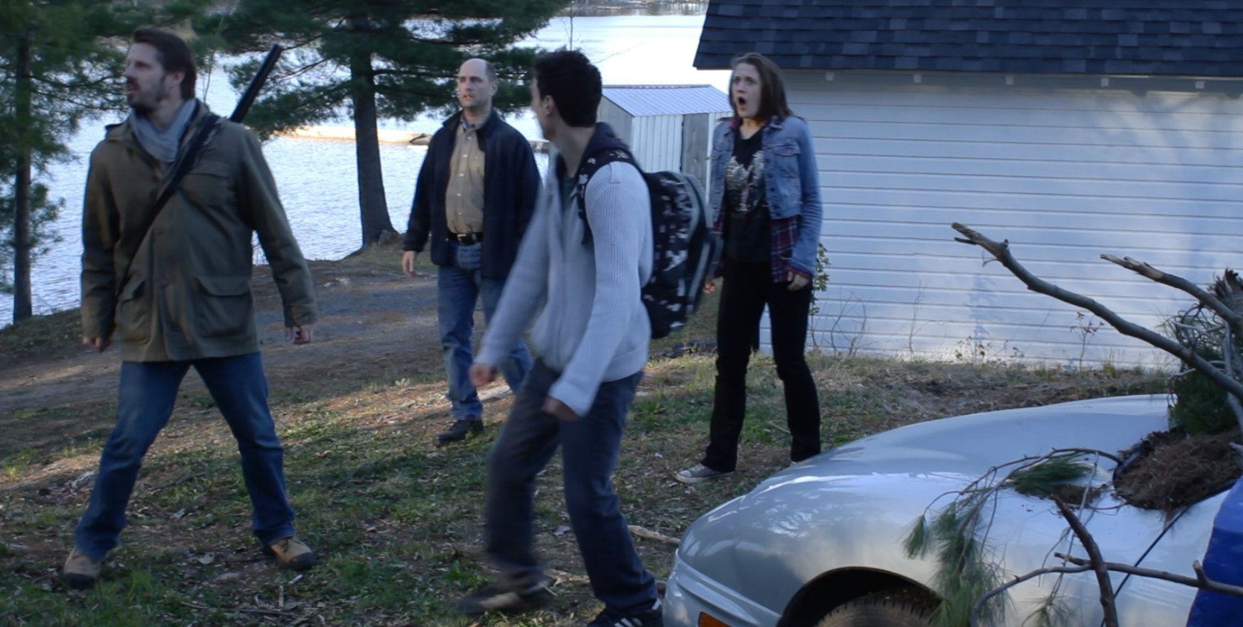 Les, Charles, Dan and Cheyna are confronted by the entity.