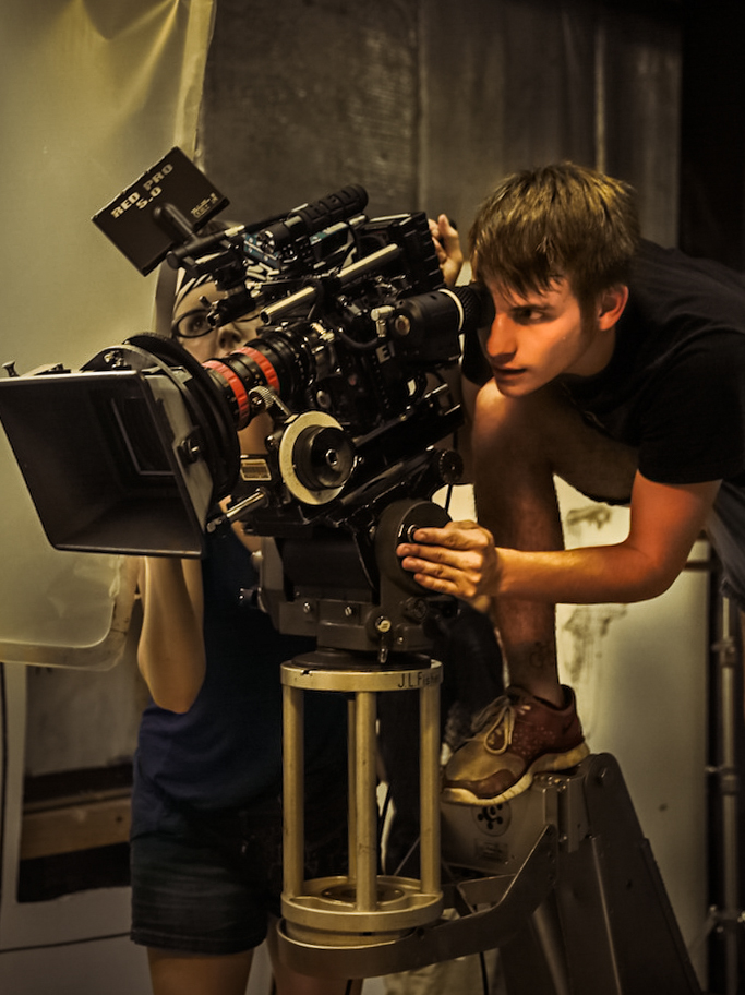 Taylor lining up a shot on the set of Avant-Tarde