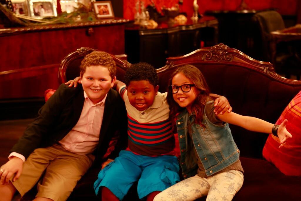 Cade Sutton with Lil' P-Nut (Benjamin Flores Jr.) and Breanna Yde on the set of 