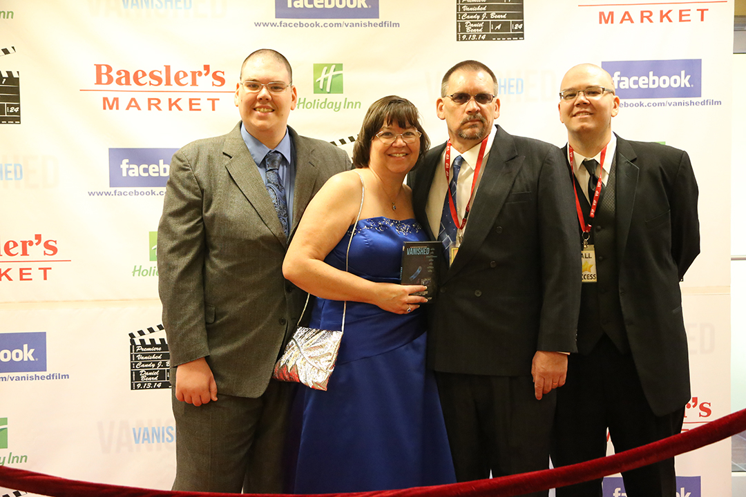 The Beard family, who make up Dreams Come True Films, walk the red carpet at the Vanished film premiere on 09.13.14 From left: Christopher Beard (Producer), Candy J. Beard (Executive Producer), Mark Beard (Producer) and Daniel J. Beard (Director)