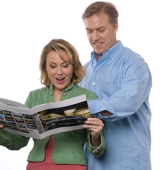 John Elway and Meredith Thomas in a print advertisement for Toyota.