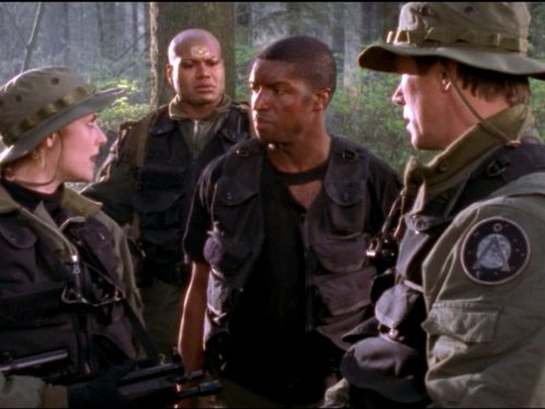 Still of Richard Dean Anderson, Roger R. Cross, Christopher Judge and Amanda Tapping in Stargate SG-1 (1997)