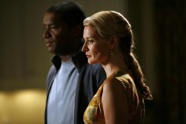 Still of Roger R. Cross and Andrea Powell in The Gates (2010)