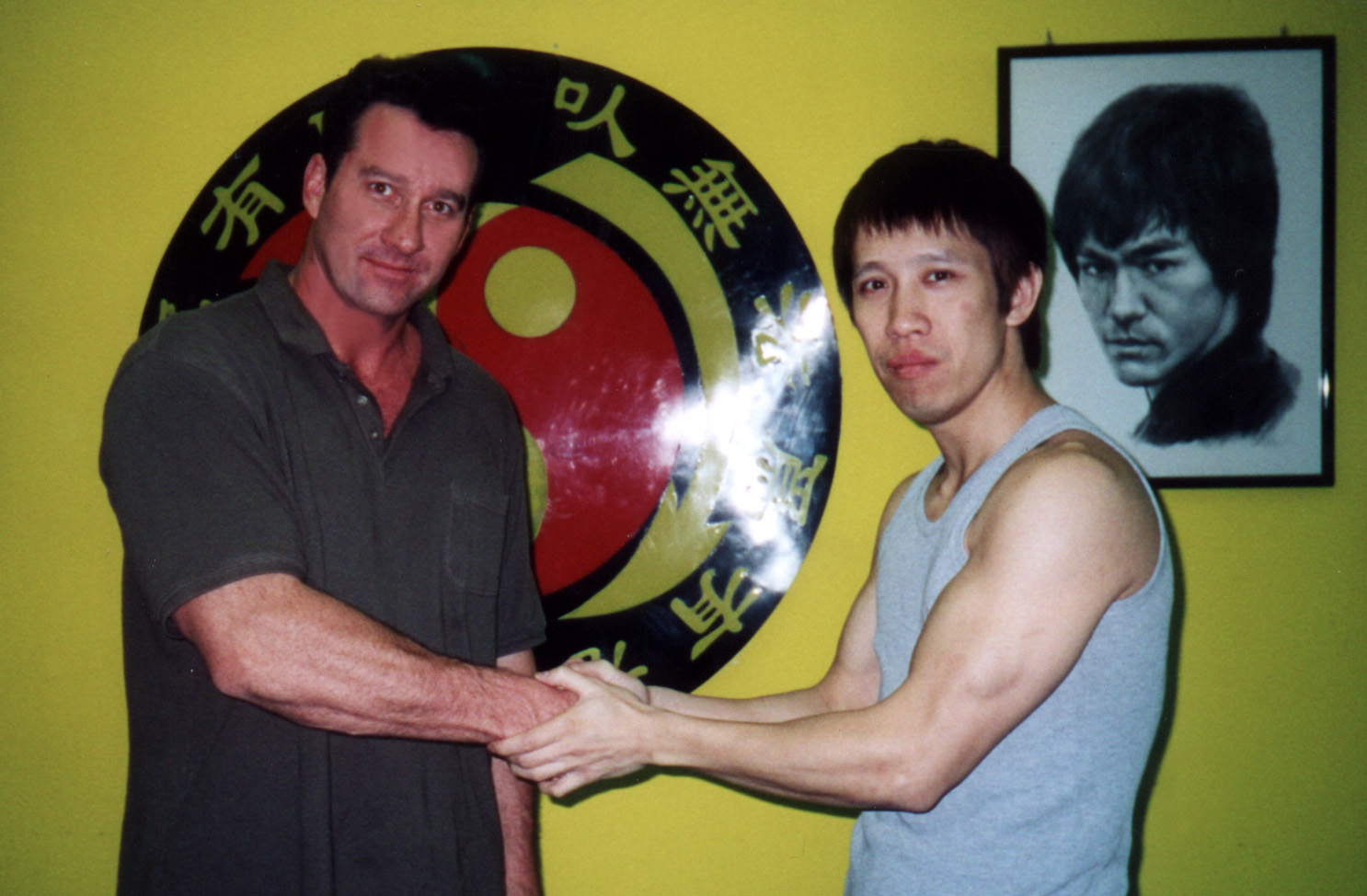 Richard O Ryan aka Richard Ryan with an appreciative student after training a class of Jeet Kune Do in Hong Kong