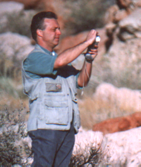 Taking a light reading while on location in the Mojave Desert