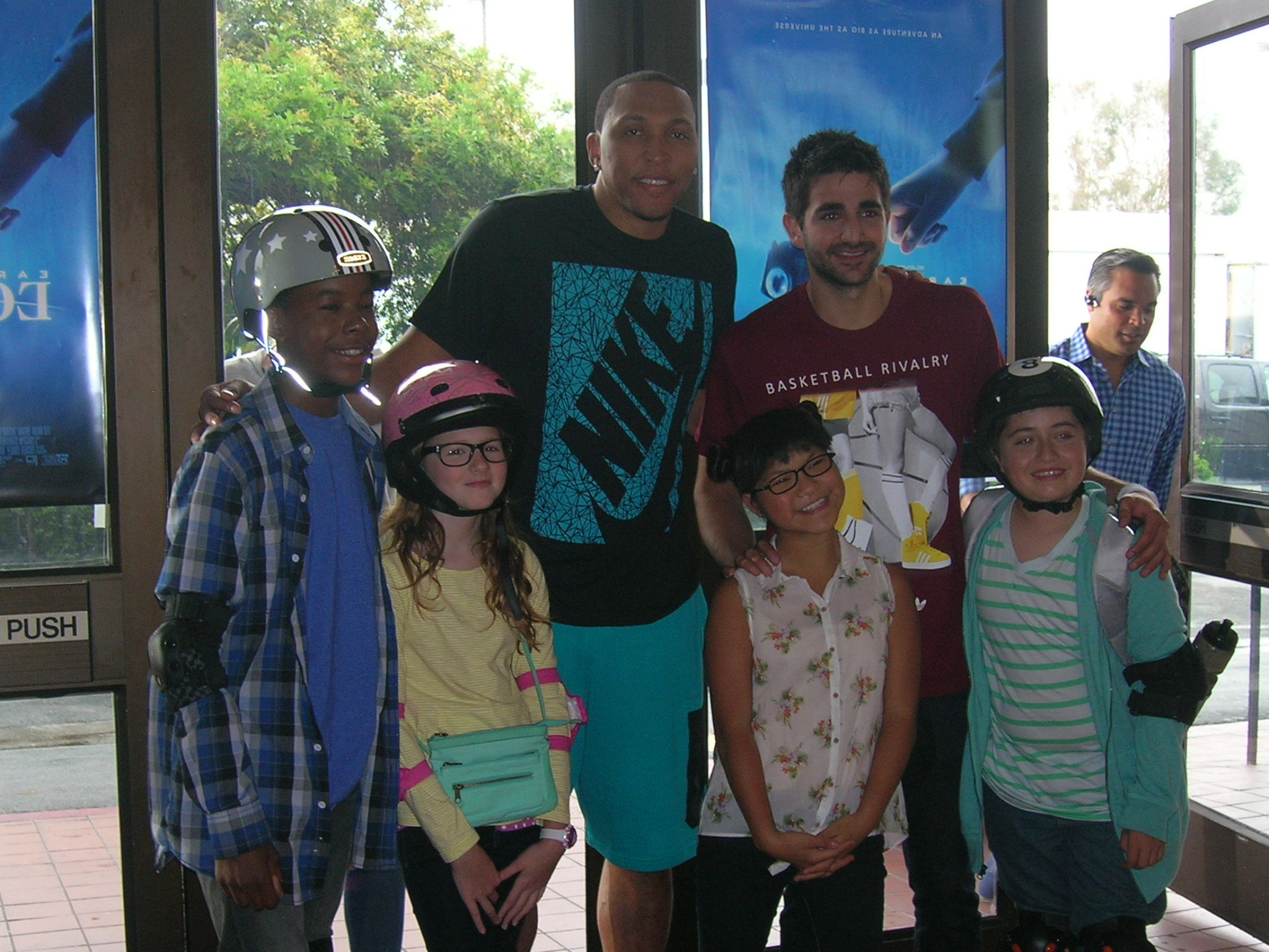 Ella with NBA stars Shawn Marion and Ricky Rubio on set of 