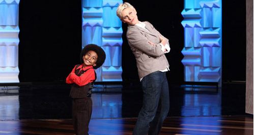 Miles Brown dances & poses with Ellen DeGeneres.