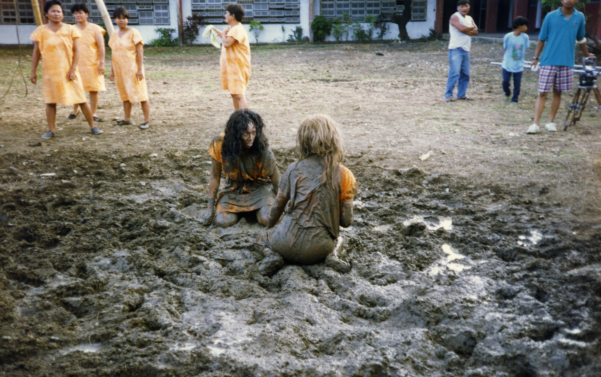 Pamella D'Pella as Paula, in the famous mud fight scene from 