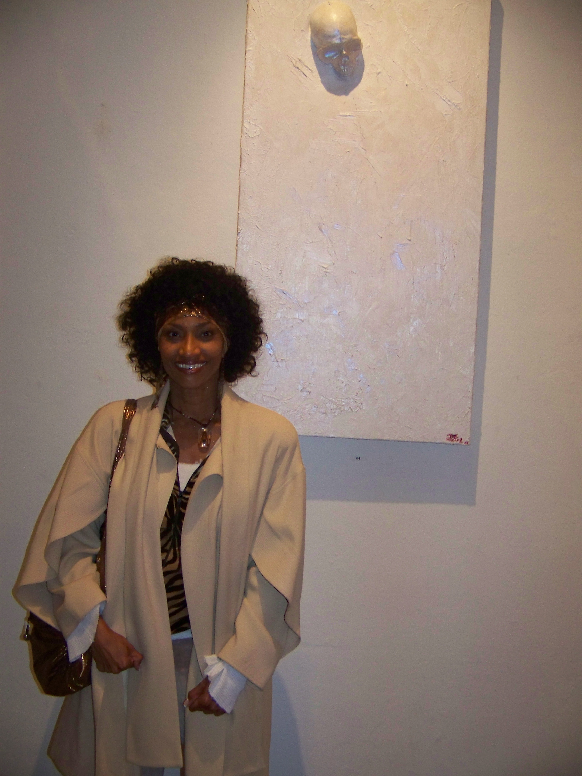 Pamella D'Pella with her art piece 