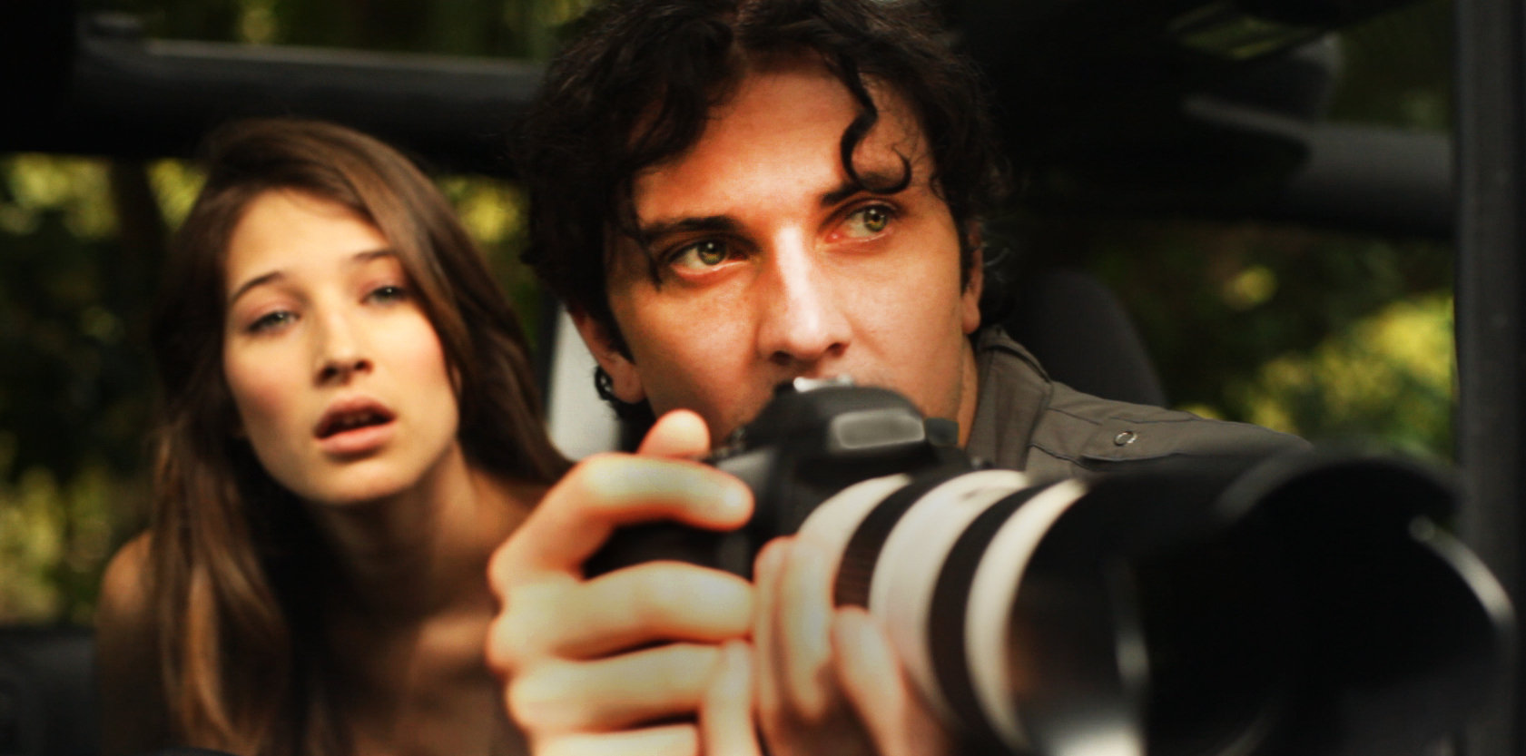 James (Joseph Myers) and Rachael (Caroline Gutierrez) staking out a suspect.