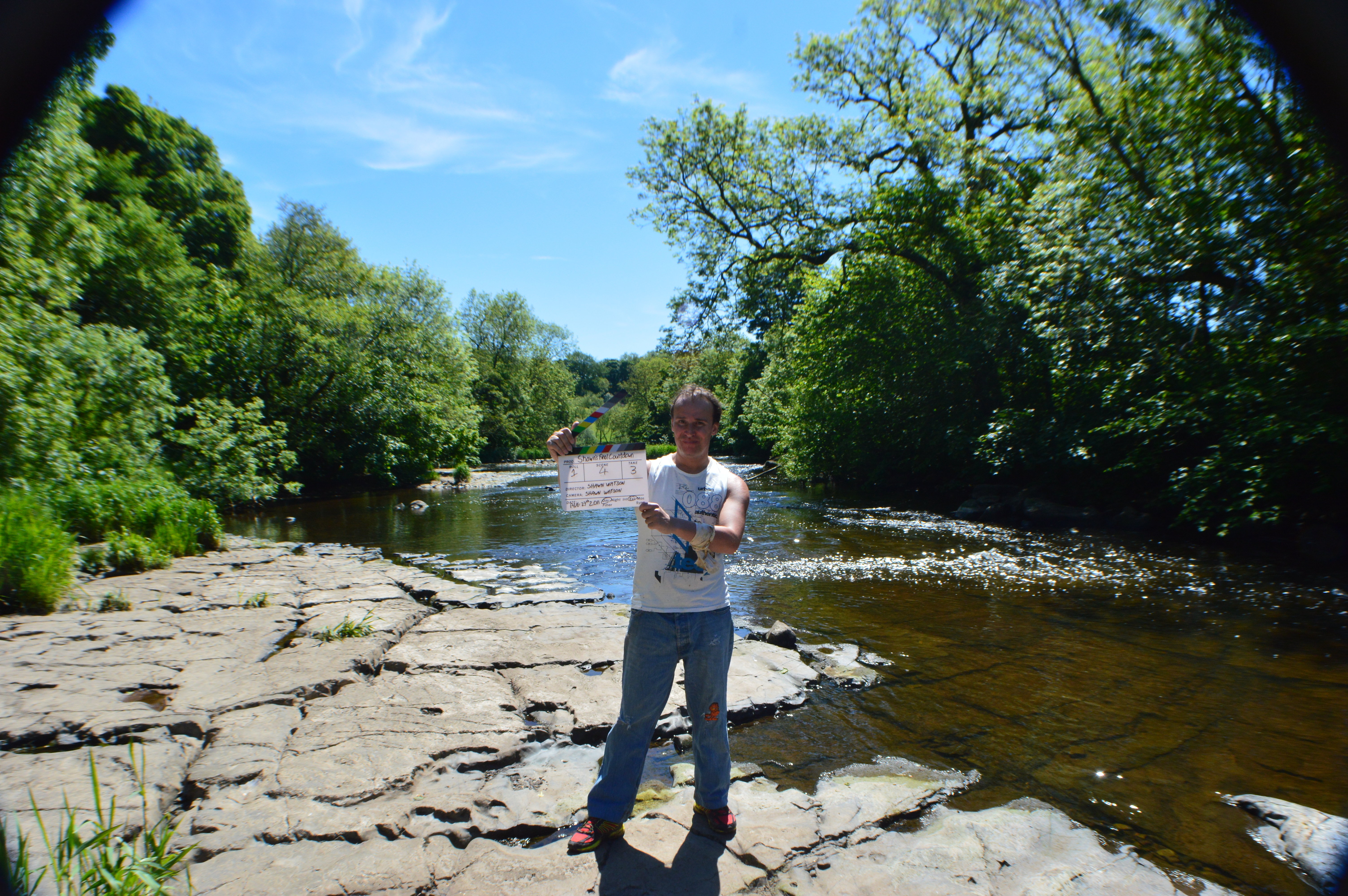 Shawn Watson on location on a dry river bed.