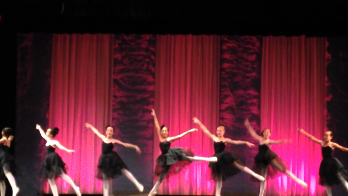 Asia Aragon (middle) dancing ballet (pointe)