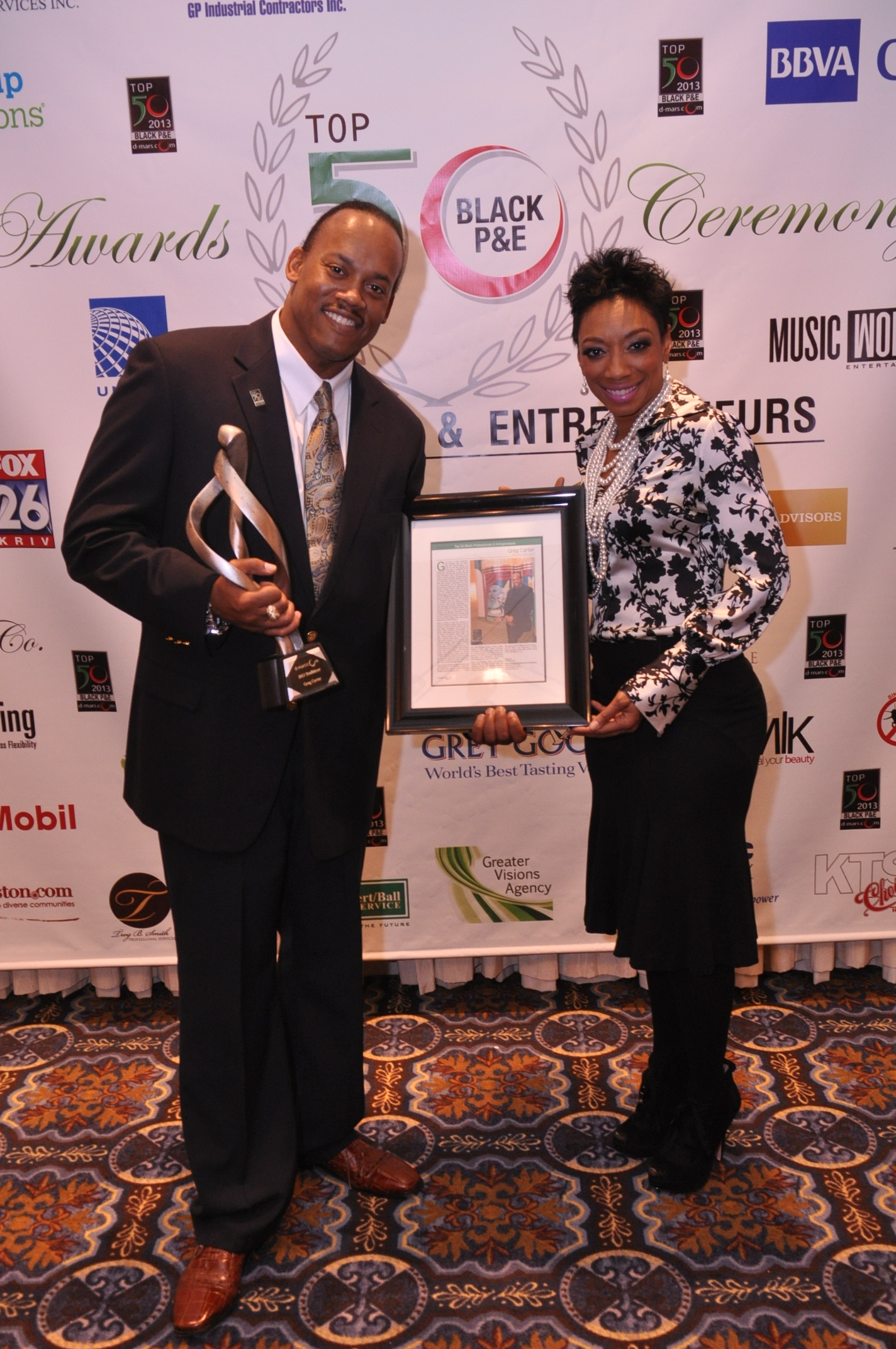 Filmmaker Greg Carter with Actress/Attorney Jalene M. Mack at the Top 50 Black Professional & Entrepreneurs Award Show in Houston, Texas.