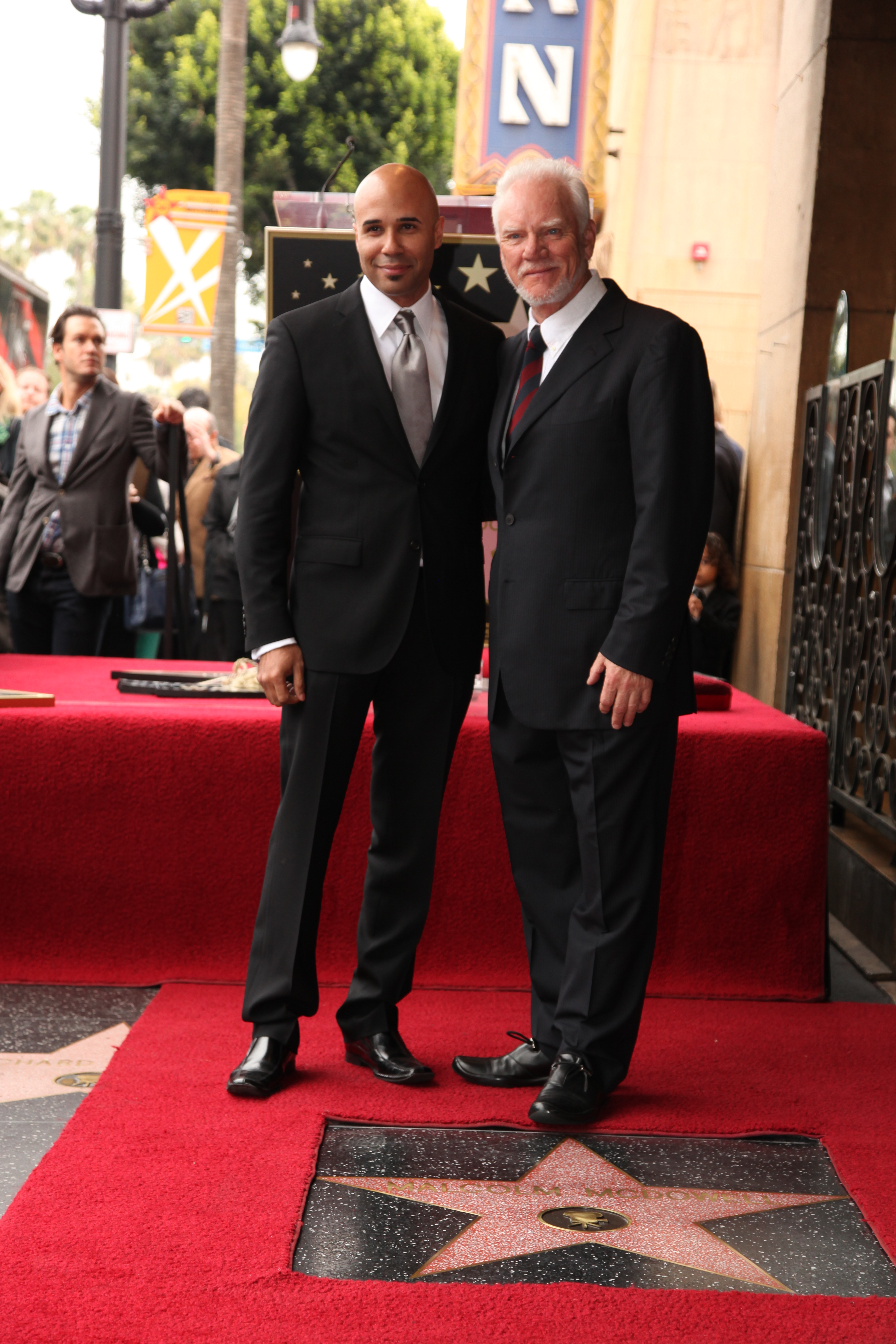 Manager/Producer Chris Roe with Actor Malcolm McDowell. Malcolm McDowell Honored With A Star On The Hollywood Walk Of Fame on March 16, 2012 in Hollywood, California.