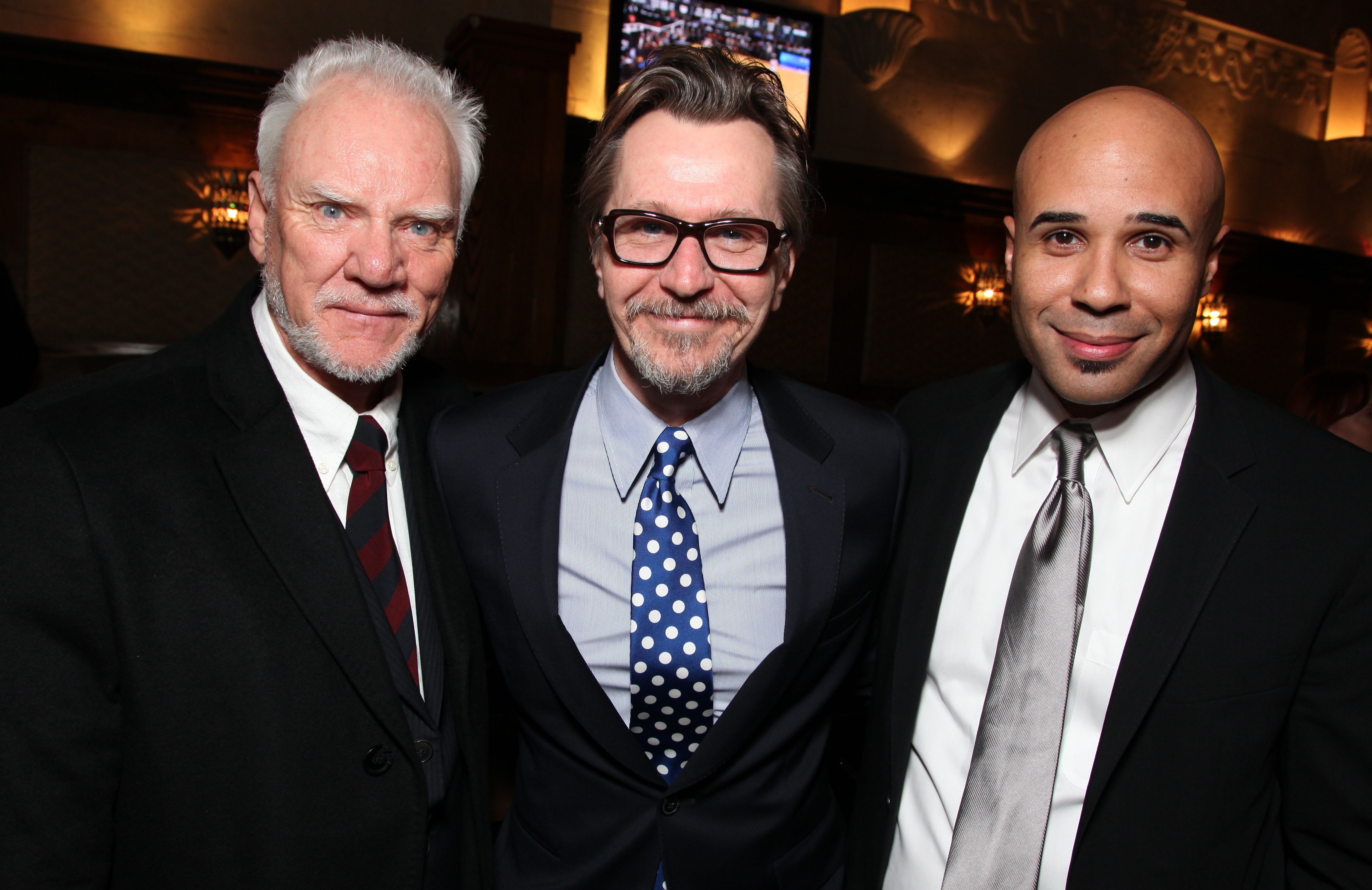 Actor's Malcolm McDowell, Gary Oldman and Manager/Producer Chris Roe. Malcolm McDowell Honored With A Star On The Hollywood Walk Of Fame on March 16, 2012 in Hollywood, California.