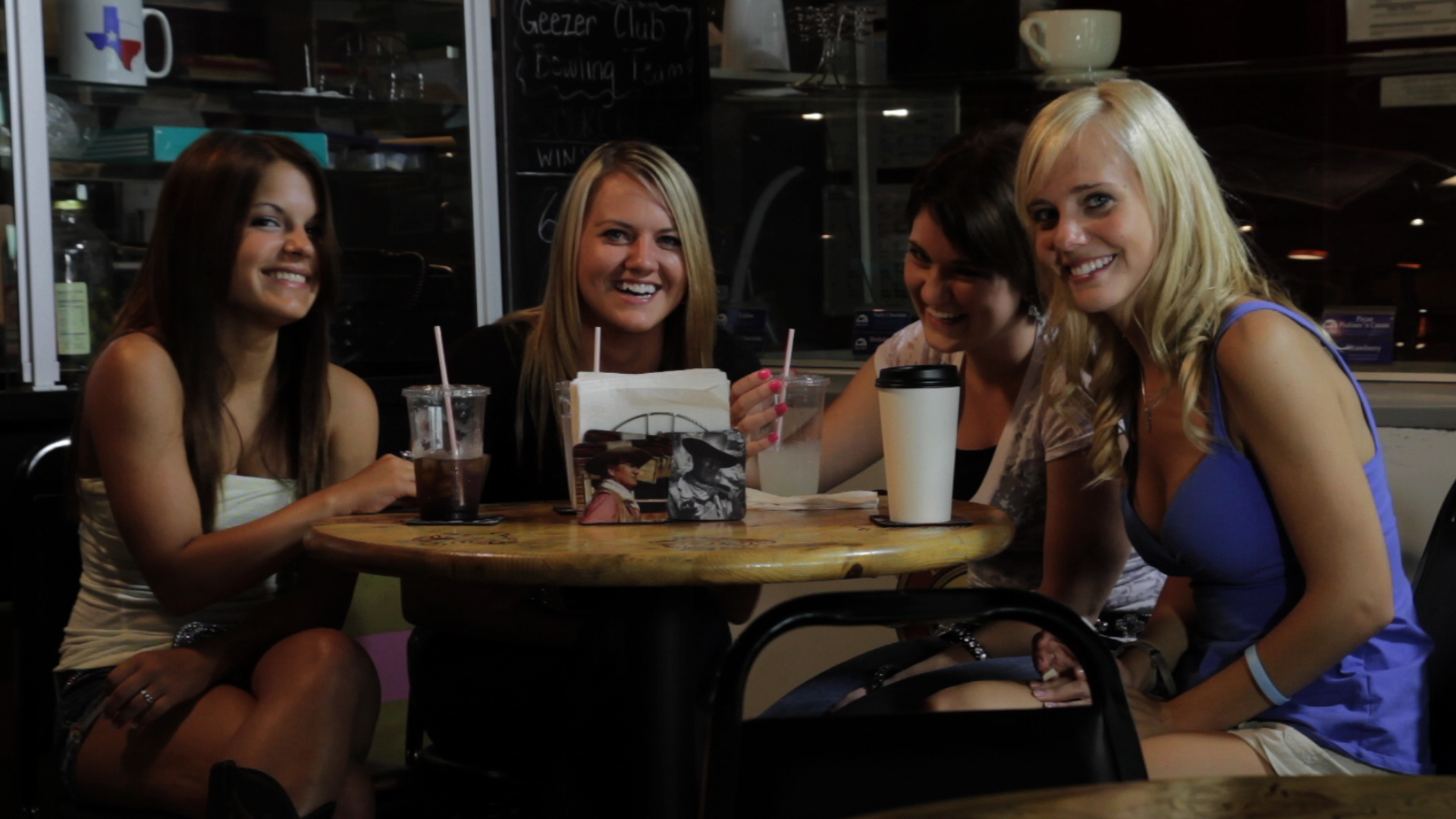 L-R Nikki Weishuhn, Keegan Skalka, Callie Byler, and Kelly Park in the cafe scene of 