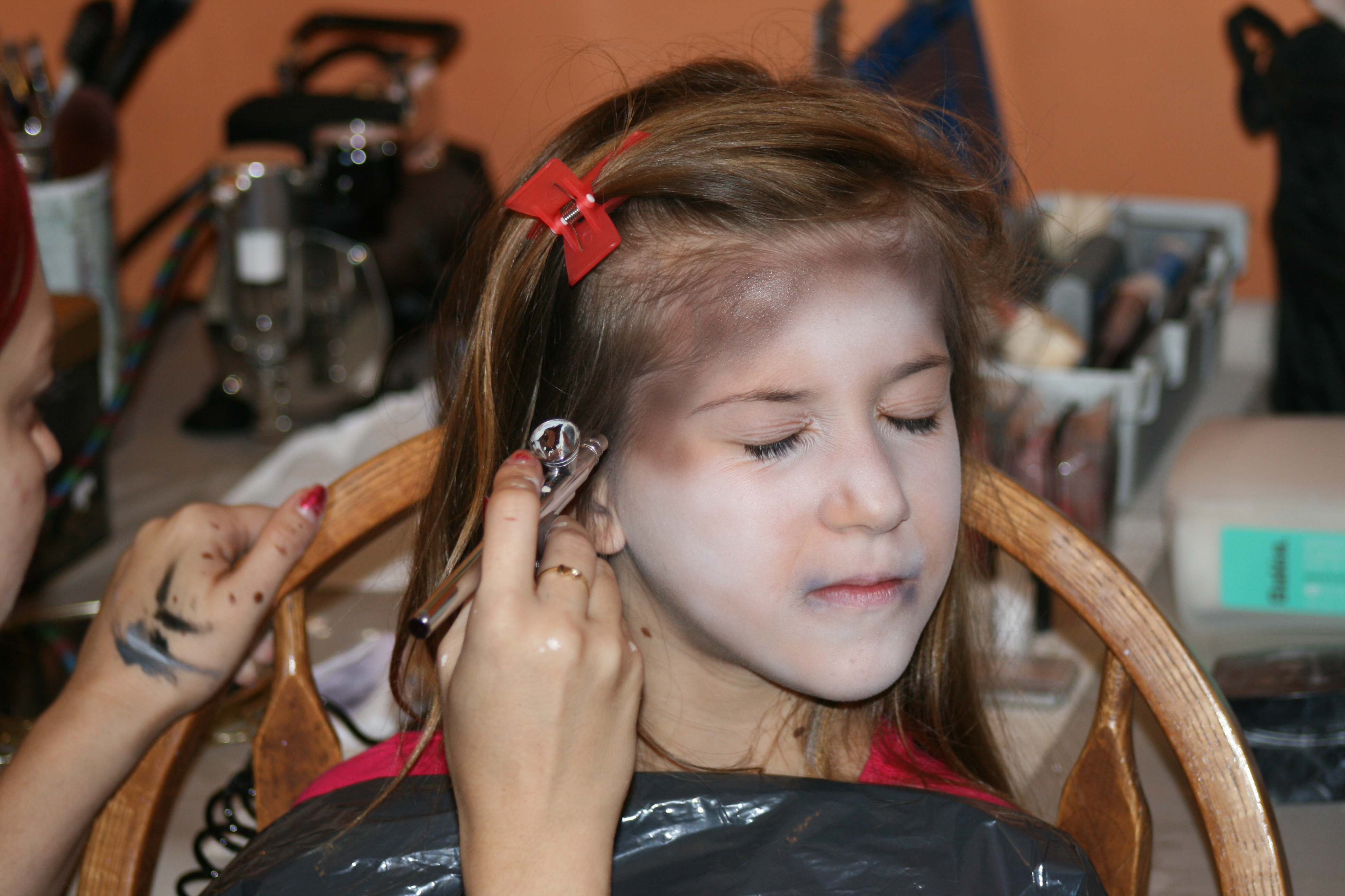Gloria getting her makeup done for her first ZOMBIE film.