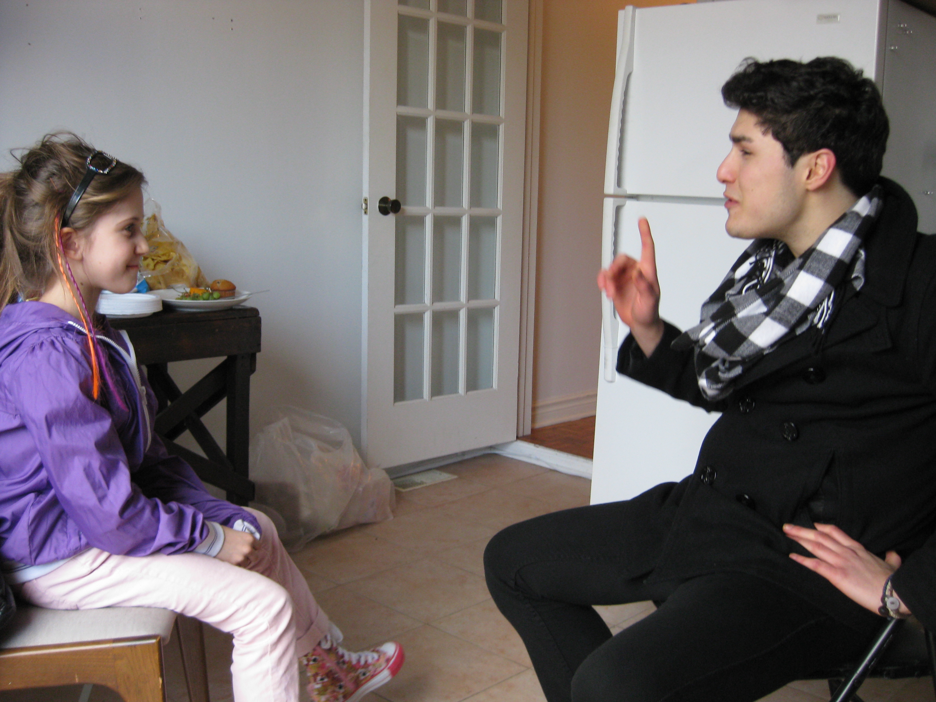 Gloria getting direction from the director on the set of FIVE MINUTE CALL ~ A RYERSON UNIVERSITY SHORT FILM