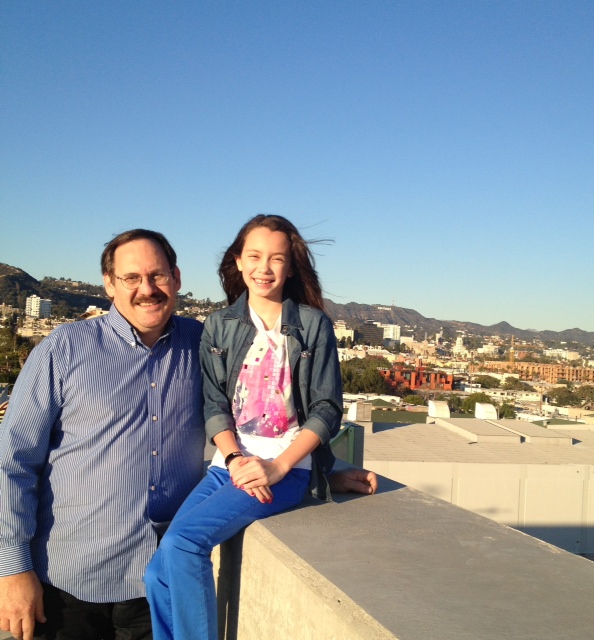Meeting with Executive Producer on the roof of Studio Lot with the Hollywood sign in the background. Hollywood, California. 2013