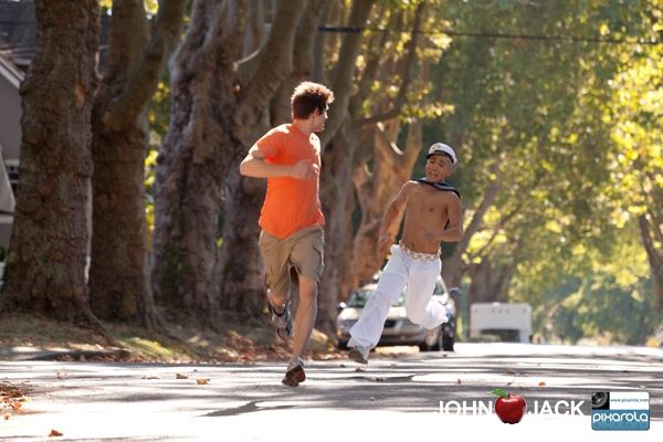 Set still of John (Chris McNally) escaping from Marco (Alvin Tran) in John Apple Jack.