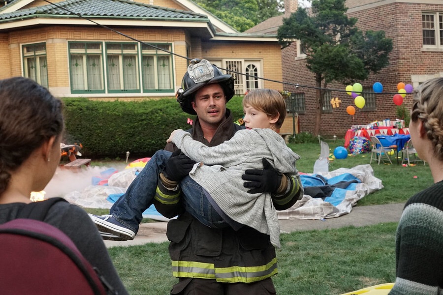 Jaden Klein as Kevin Sullivan with Taylor Kinney as Kelly Severide on Chicago Fire, 2015