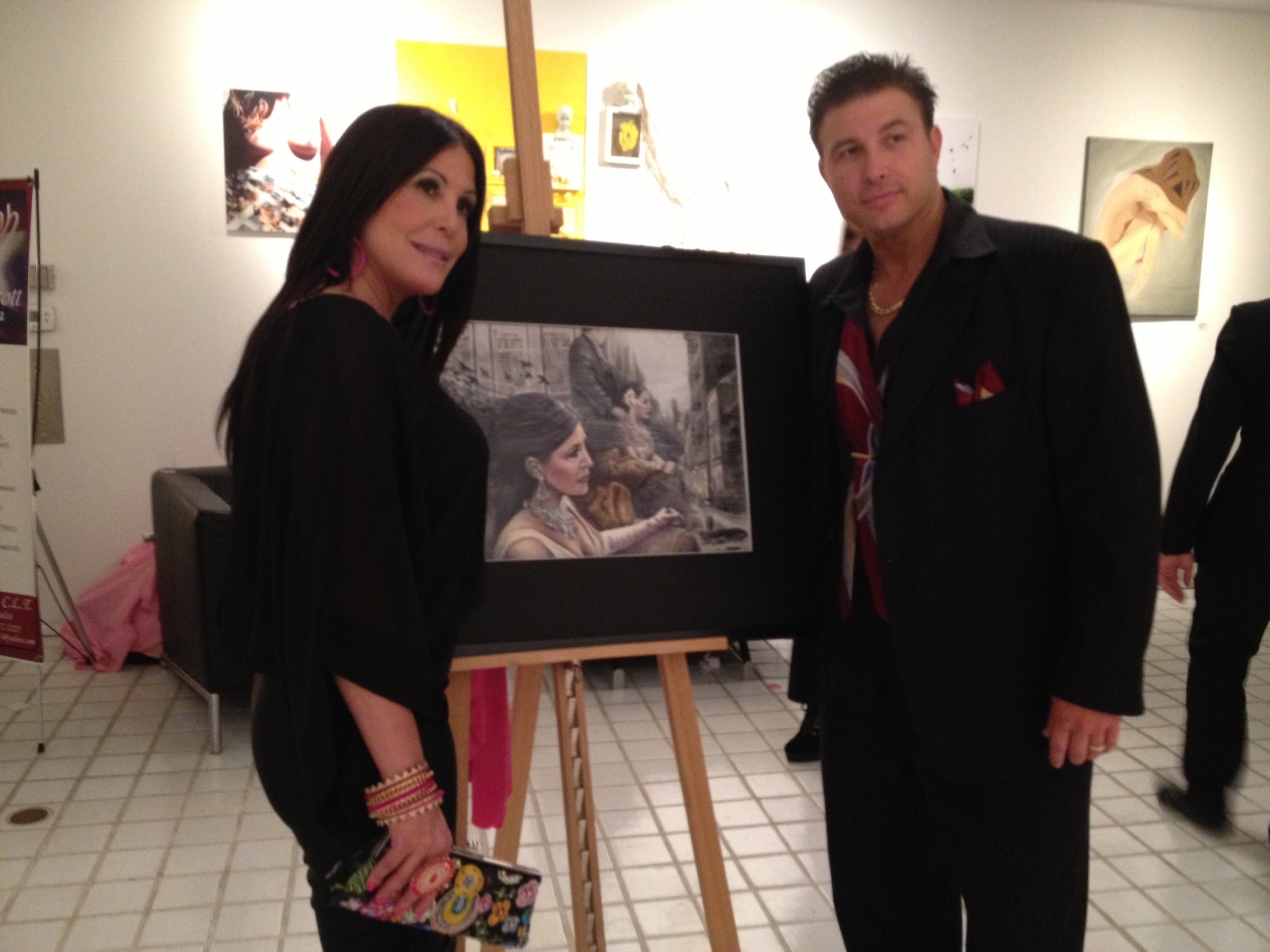Michael Bell filming a Red Carpet painting unveiling with Toni Marie Ricci for Mob Wives Season 3