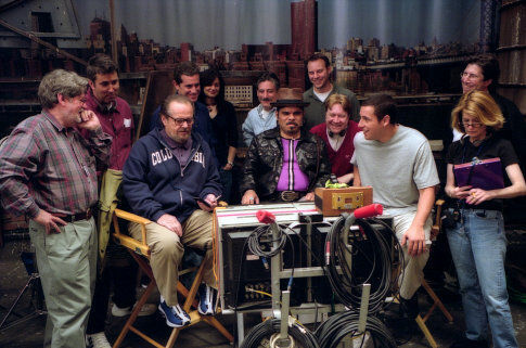 (center, l to r) Jack Nicholson, Luis Guzman and Adam Sandler view a scene replay on set.