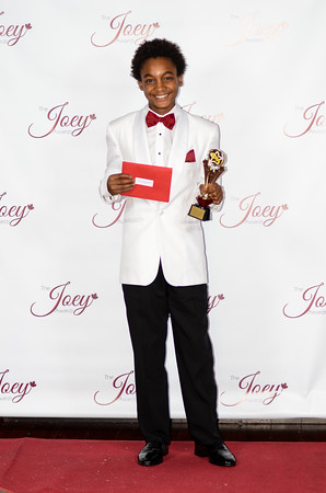 Elijha with his trophy win at the 2014 Joey Awards