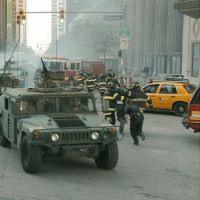 David Goebel in Avengers - Man running away . With New York Police and New York Fire in Battle of New York
