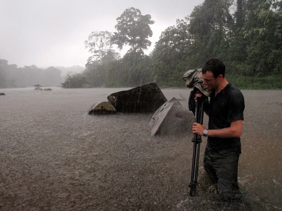 Documenting petroglyphs, while wading through the Rio Platano during a torrential rainstorm in Honduras. I was the lead photographer on a National Geographic archaeological expedition into La Moskitia.