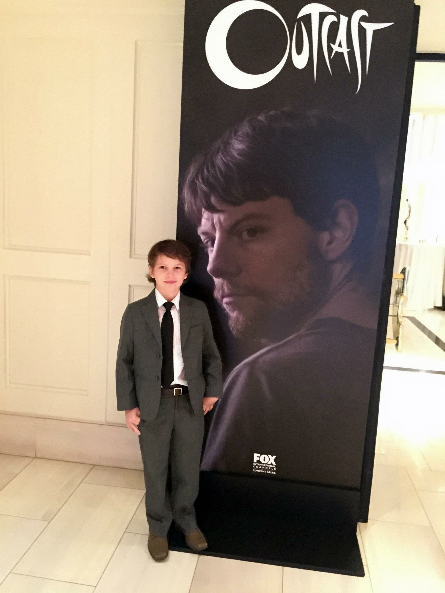 Outcast Screening standing next to his buddy!