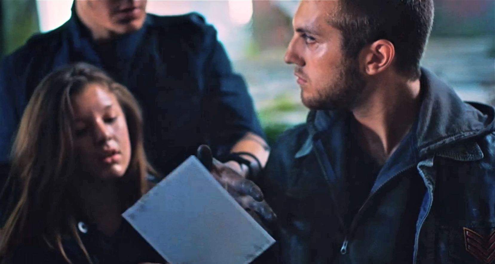 Still of Niki Cipriano (front left), and Gino Borri (right) in Lost In The Echo, by Linkin Park