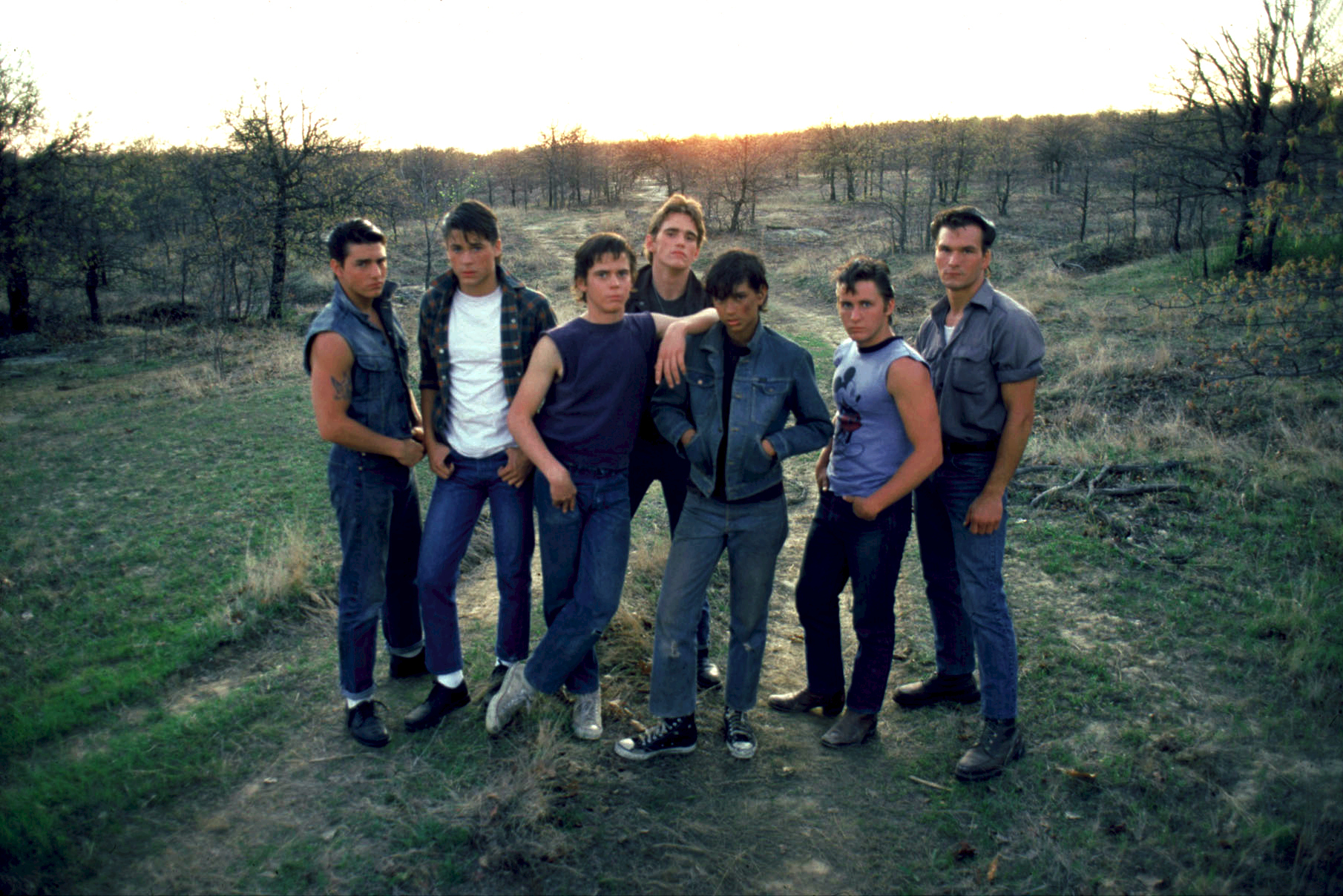 Still of Tom Cruise, Matt Dillon, Emilio Estevez, Rob Lowe, Patrick Swayze, C. Thomas Howell and Ralph Macchio in The Outsiders (1983)